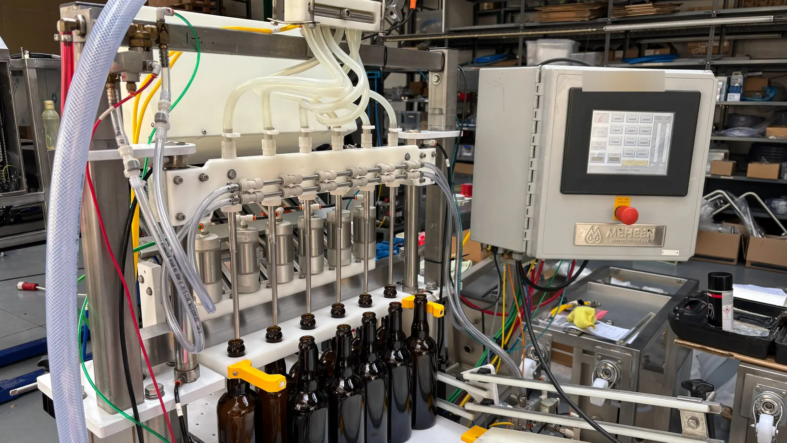 Several Meheen machines in the workshop with work in progress