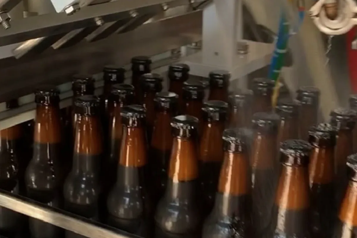 A Meheen bottling machine set up to run a 330ml bottle