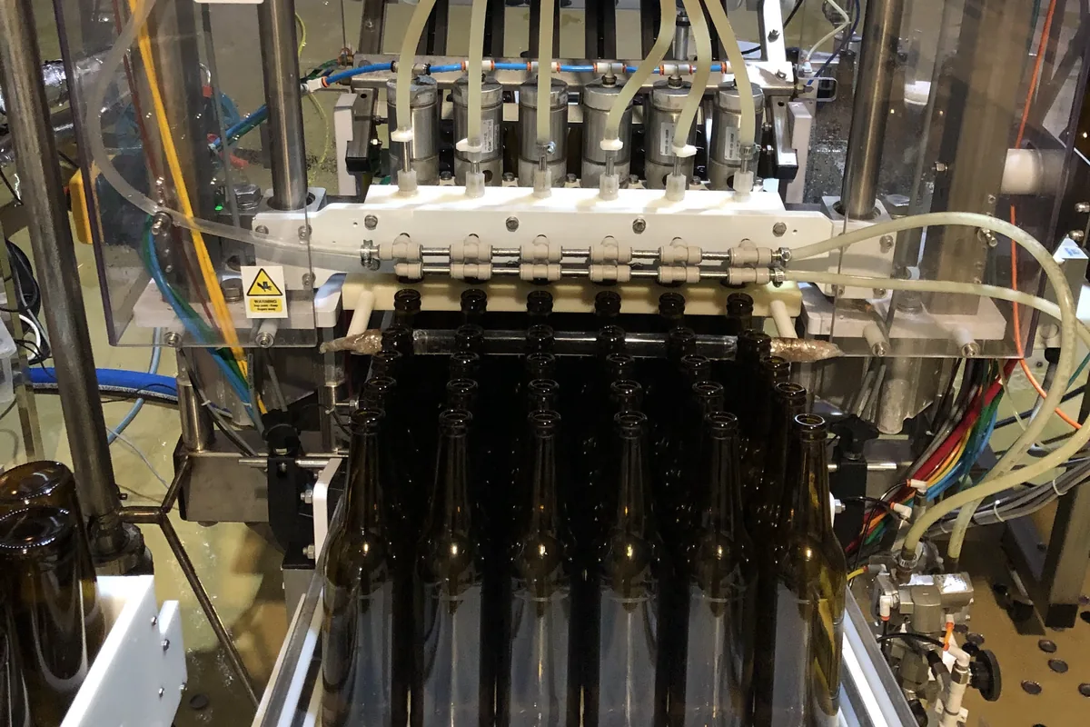 A Meheen bottling machine set up to run a 500ml bottle