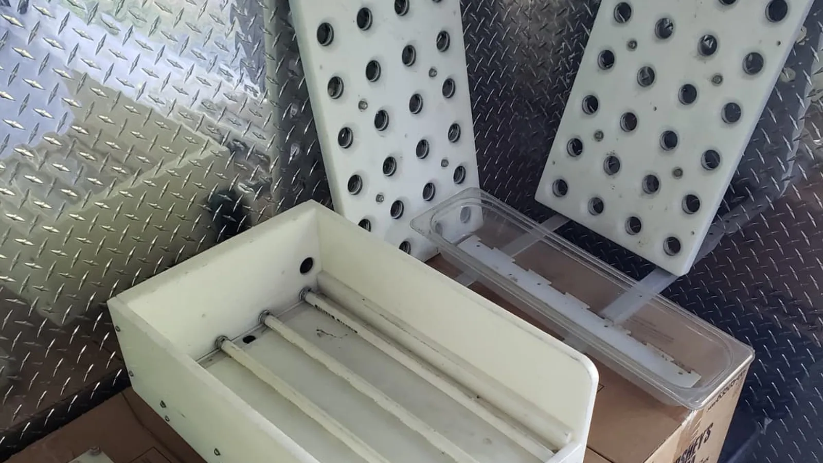 Meheen parts on the bench, laid out by subsystem
