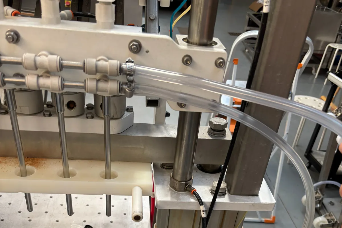 A Meheen fill section stripped on the bench, valve components visible