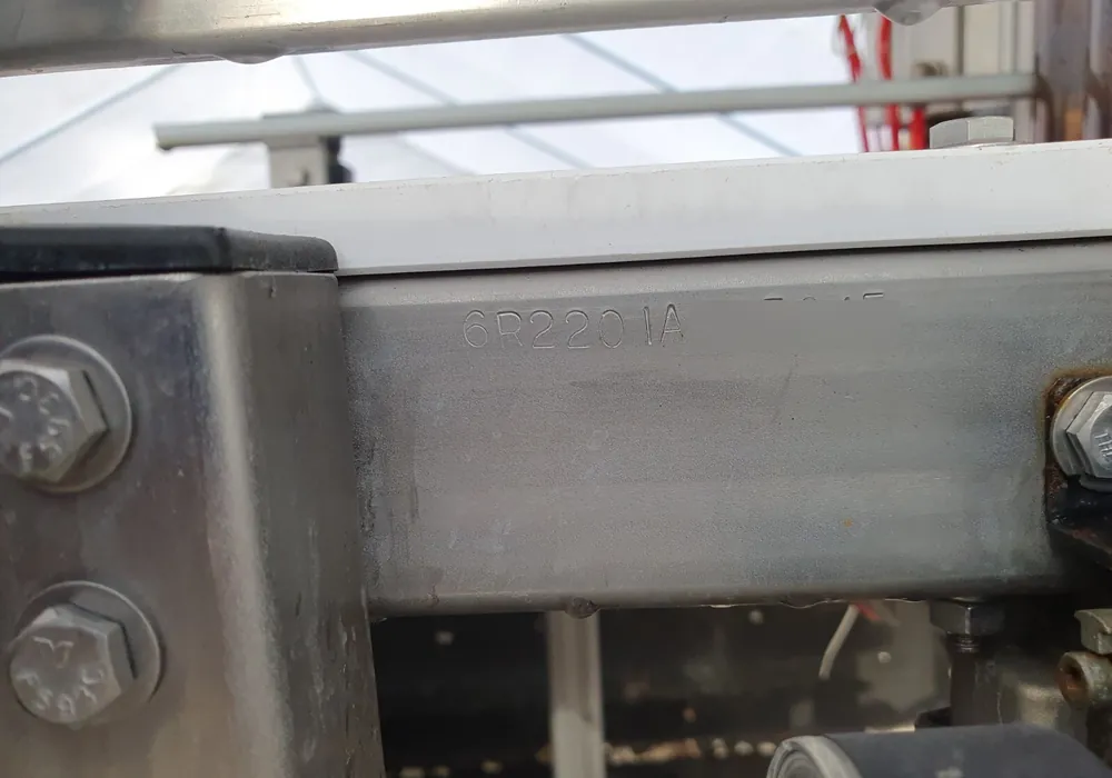 A Meheen serial number stamped into the machine body